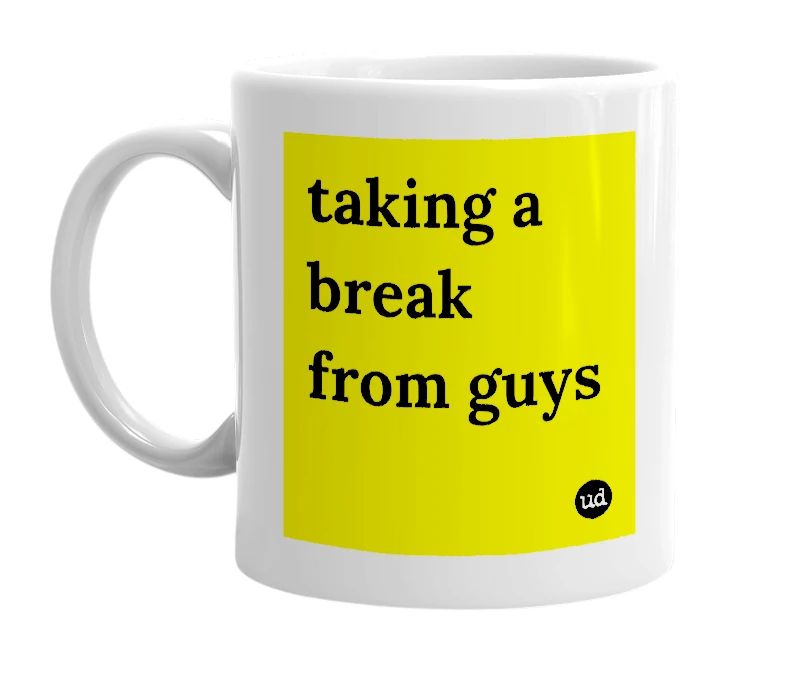 White mug with 'taking a break from guys' in bold black letters