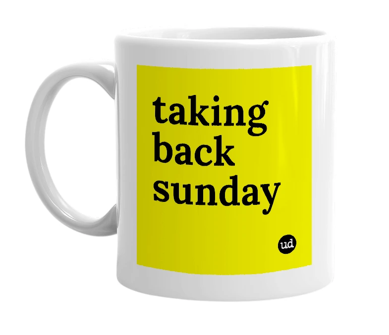 White mug with 'taking back sunday' in bold black letters