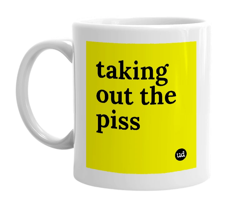 White mug with 'taking out the piss' in bold black letters