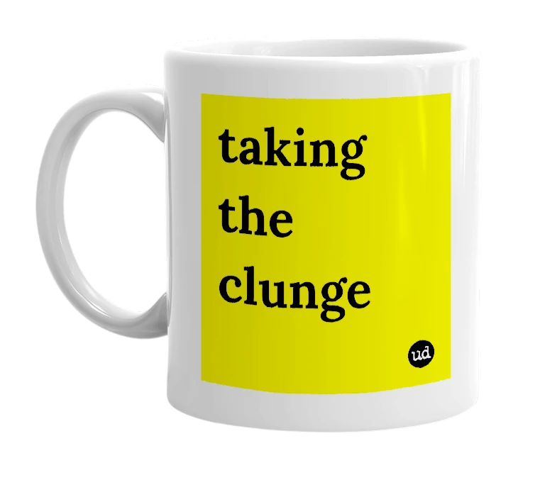 White mug with 'taking the clunge' in bold black letters