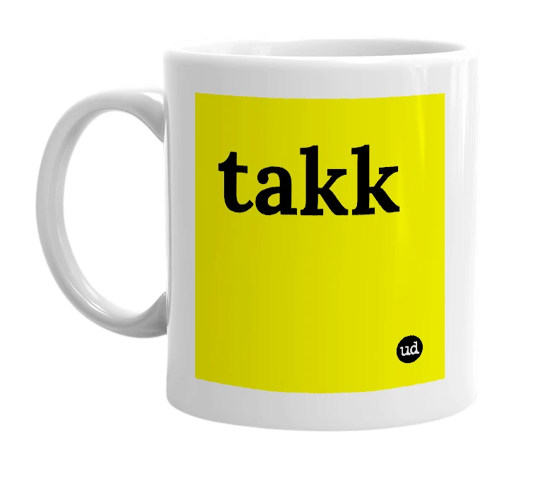 White mug with 'takk' in bold black letters