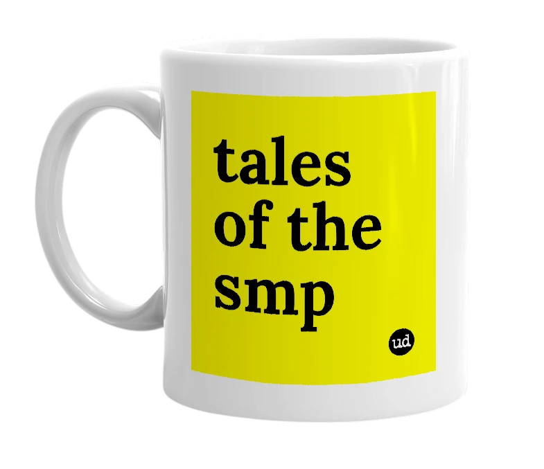 White mug with 'tales of the smp' in bold black letters