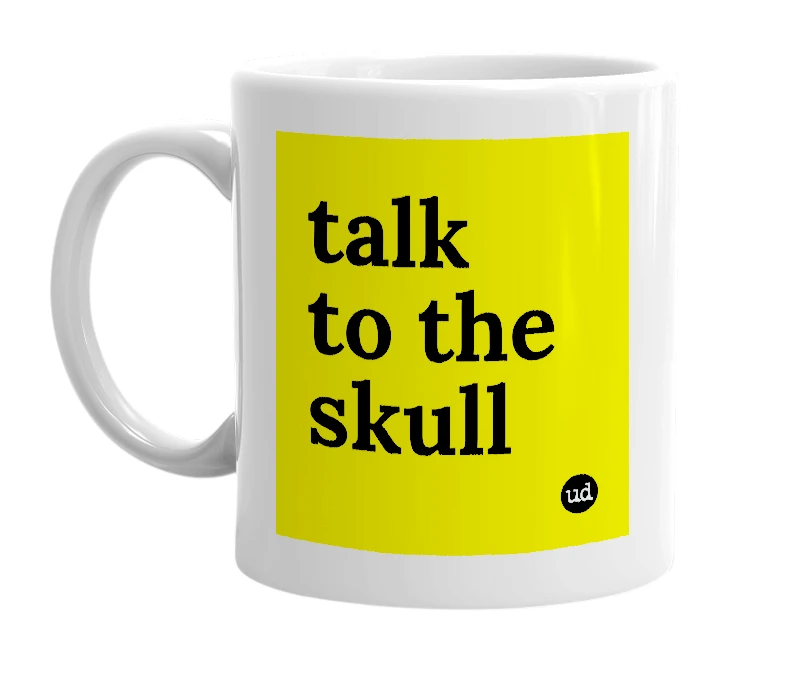 White mug with 'talk to the skull' in bold black letters