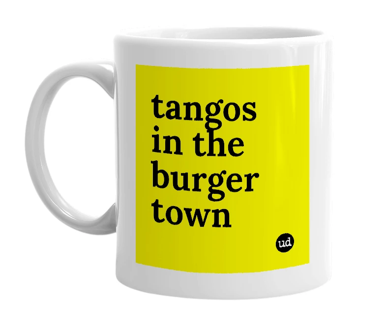 White mug with 'tangos in the burger town' in bold black letters