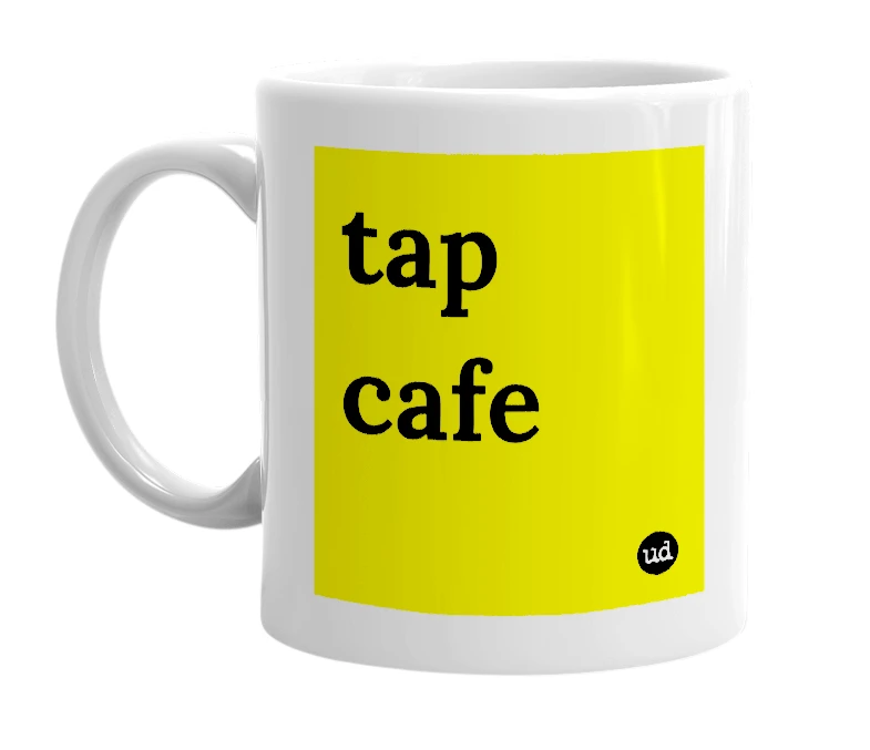 White mug with 'tap cafe' in bold black letters