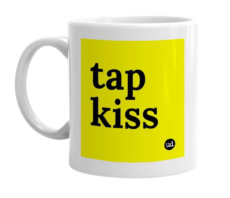 White mug with 'tap kiss' in bold black letters