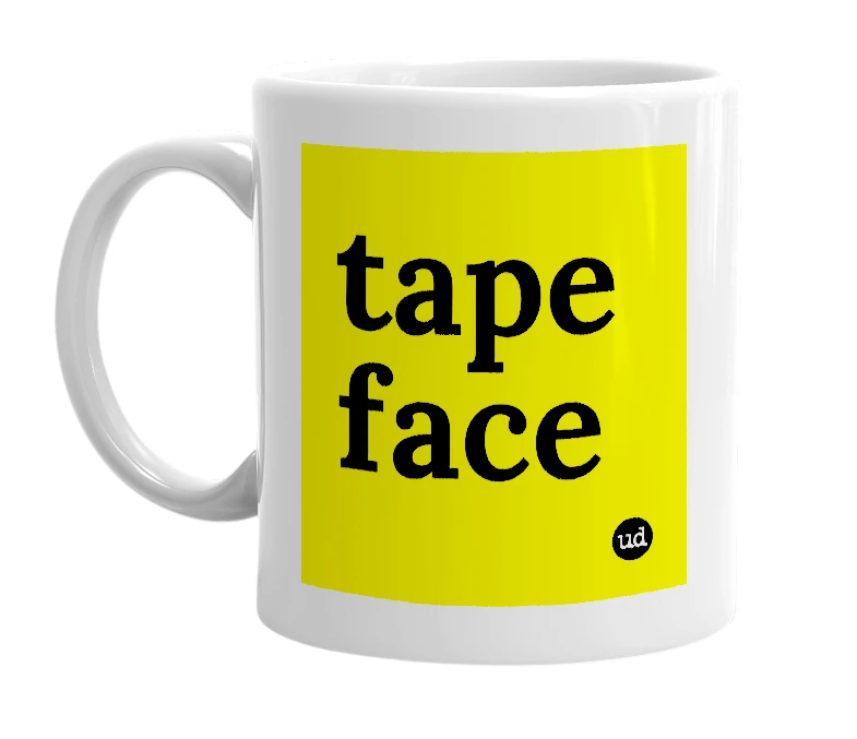 White mug with 'tape face' in bold black letters