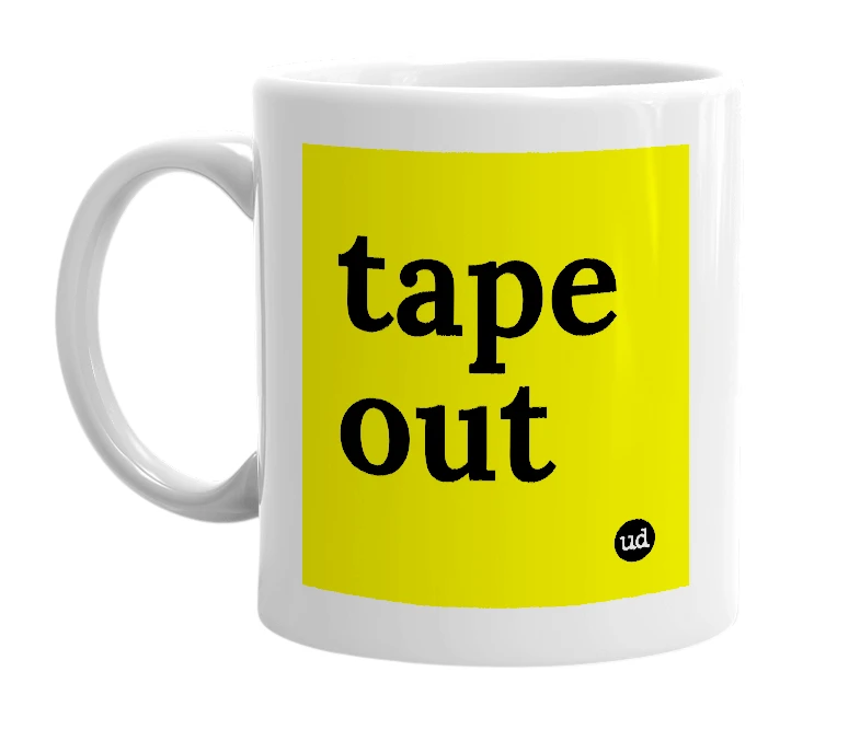 White mug with 'tape out' in bold black letters