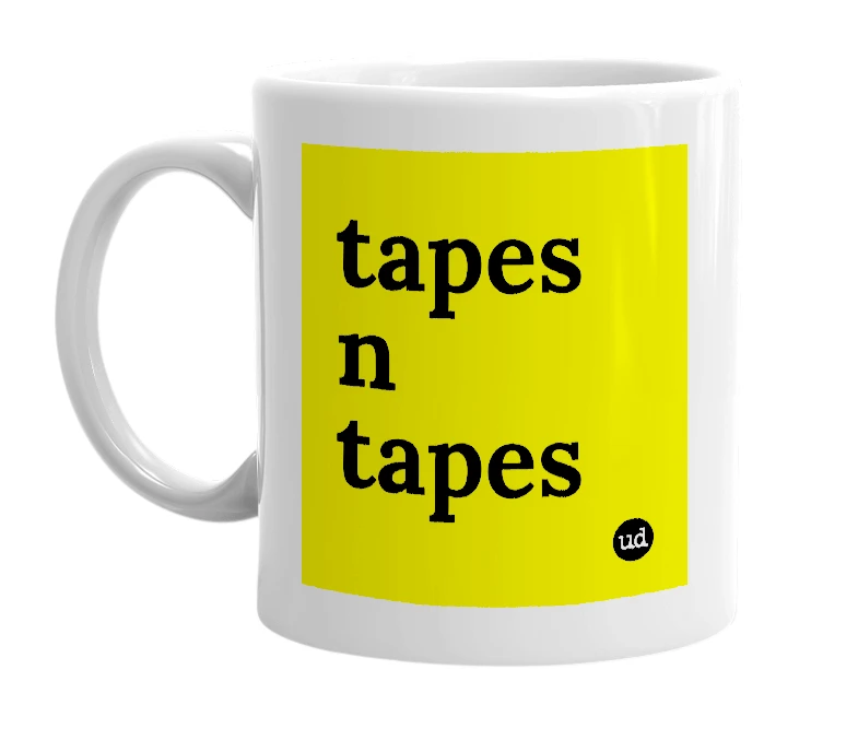 White mug with 'tapes n tapes' in bold black letters