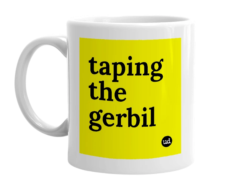 White mug with 'taping the gerbil' in bold black letters