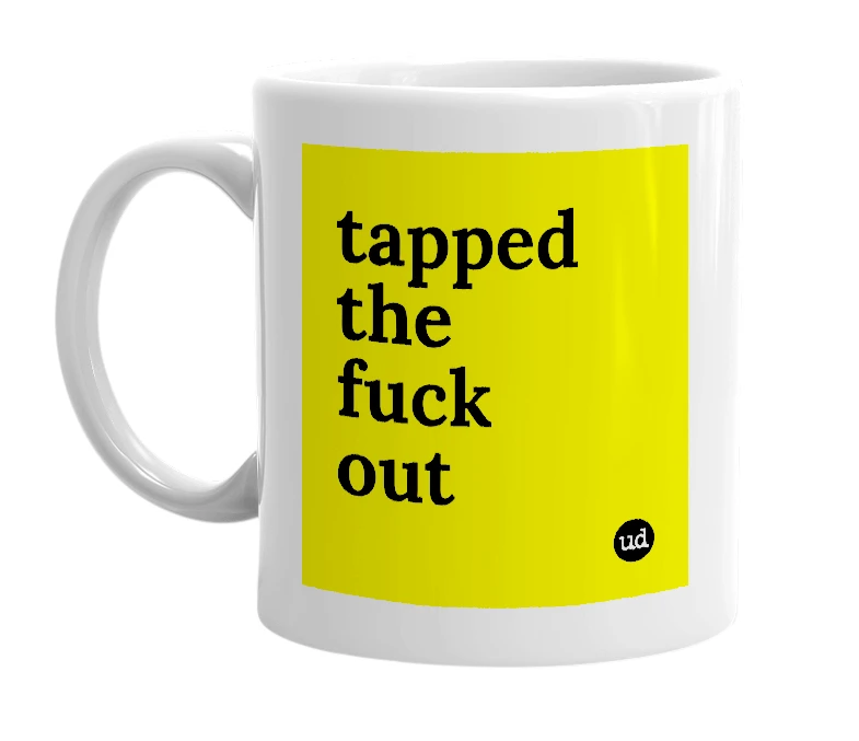 White mug with 'tapped the fuck out' in bold black letters