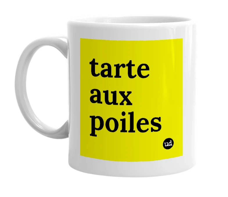 White mug with 'tarte aux poiles' in bold black letters