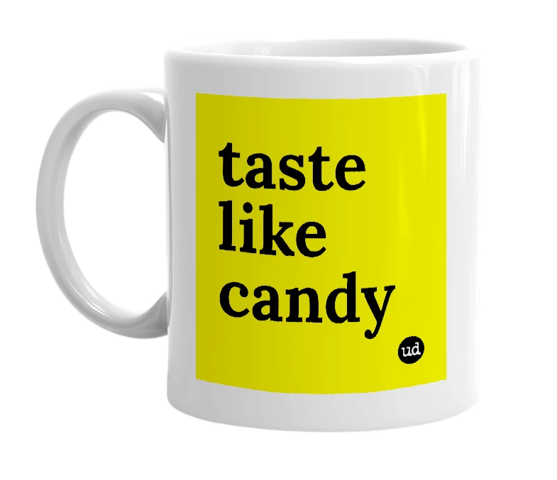 White mug with 'taste like candy' in bold black letters
