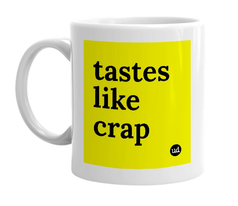 White mug with 'tastes like crap' in bold black letters