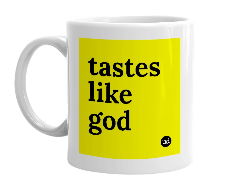 White mug with 'tastes like god' in bold black letters