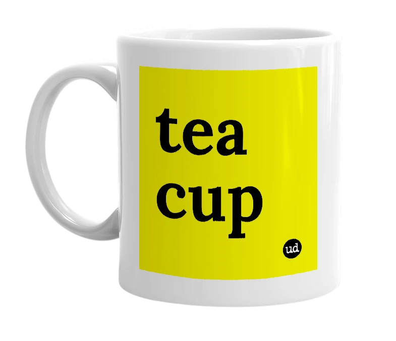 White mug with 'tea cup' in bold black letters