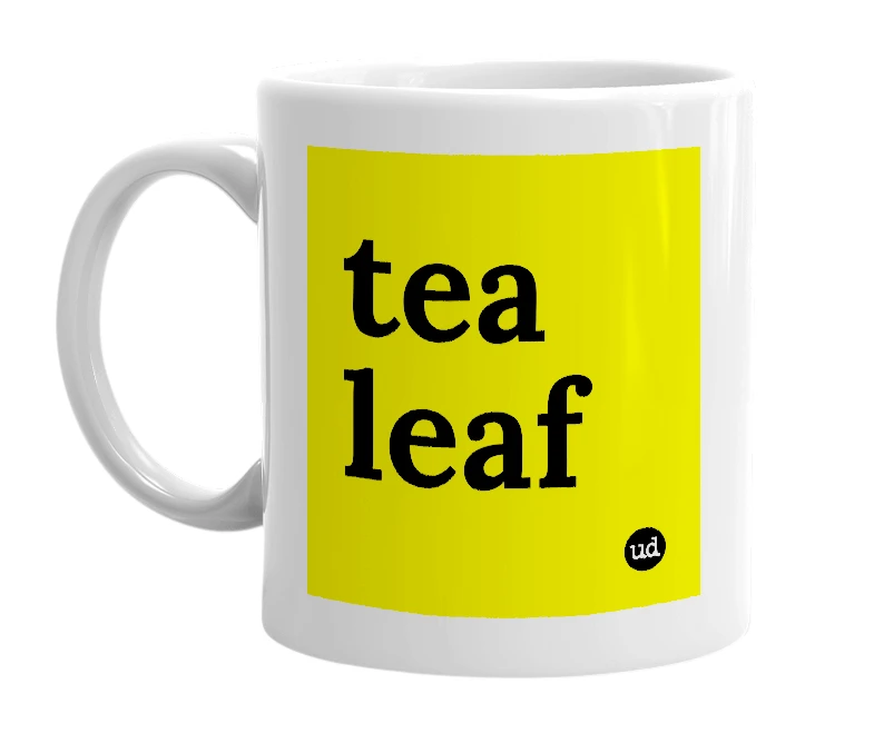 White mug with 'tea leaf' in bold black letters