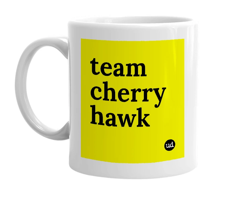 White mug with 'team cherry hawk' in bold black letters