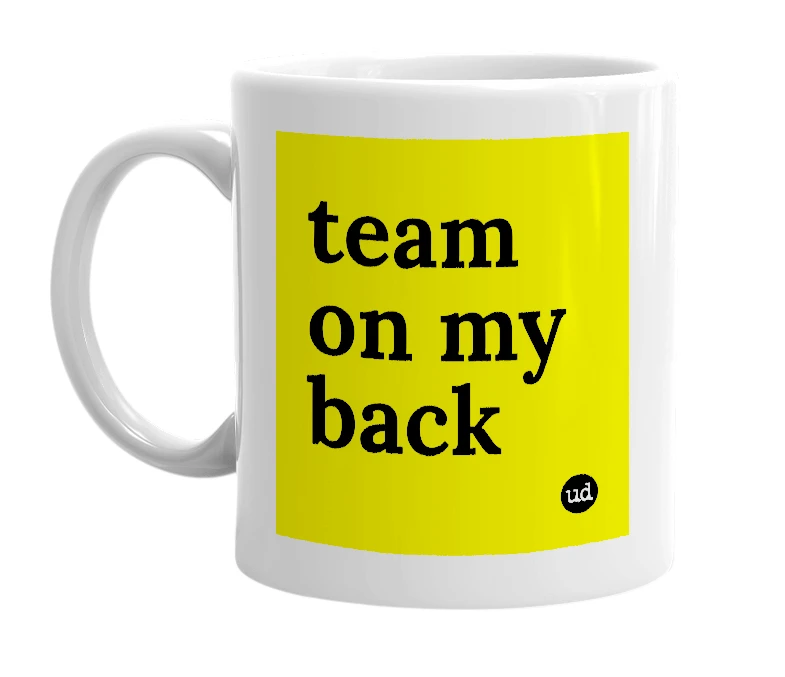 White mug with 'team on my back' in bold black letters