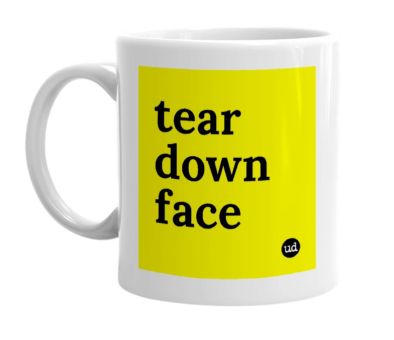 White mug with 'tear down face' in bold black letters