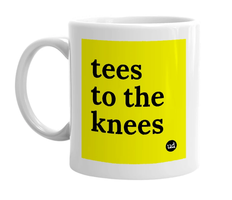 White mug with 'tees to the knees' in bold black letters