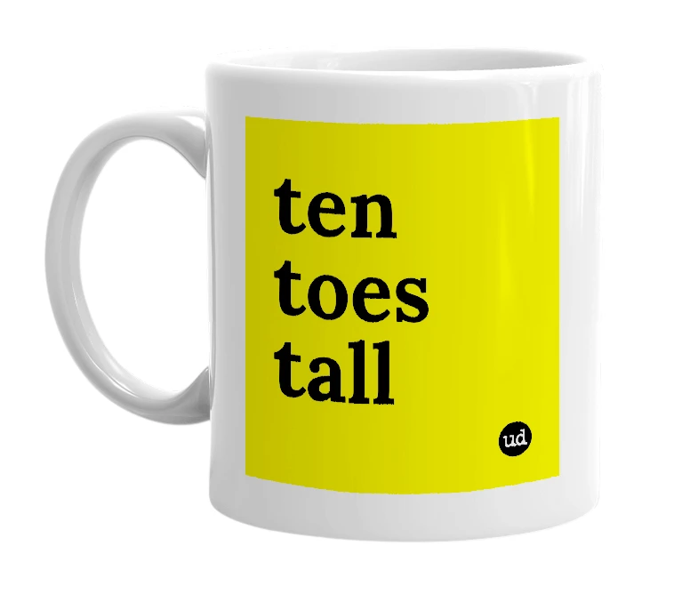 White mug with 'ten toes tall' in bold black letters