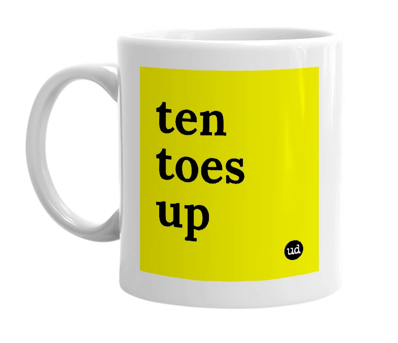 White mug with 'ten toes up' in bold black letters