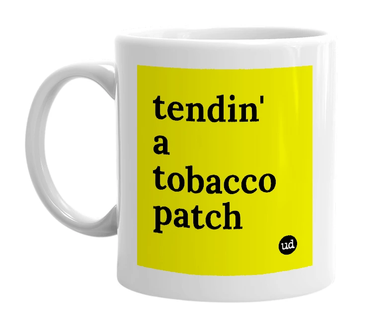 White mug with 'tendin' a tobacco patch' in bold black letters