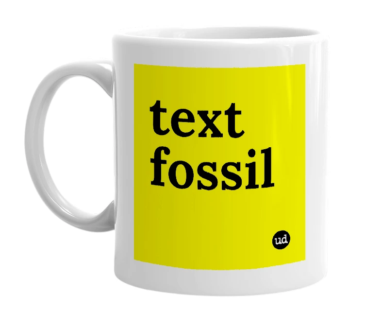 White mug with 'text fossil' in bold black letters