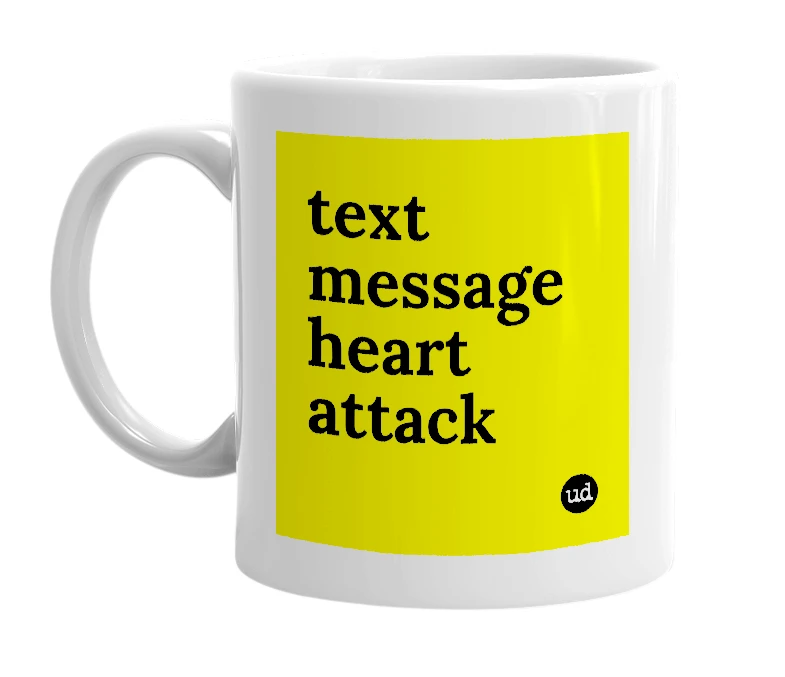 White mug with 'text message heart attack' in bold black letters