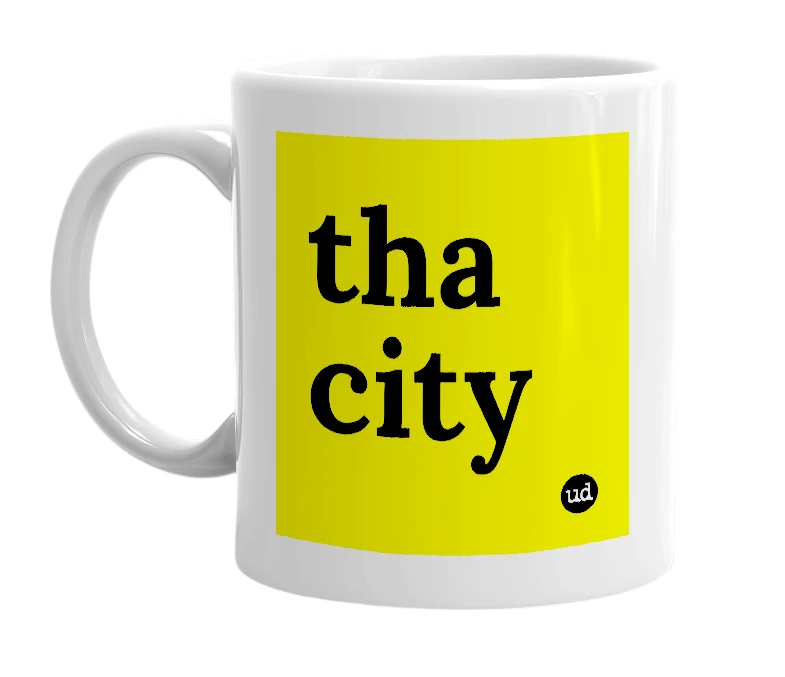 White mug with 'tha city' in bold black letters