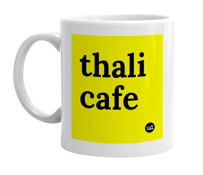 White mug with 'thali cafe' in bold black letters