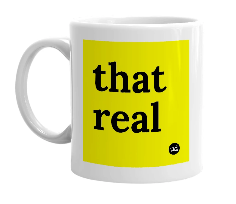White mug with 'that real' in bold black letters