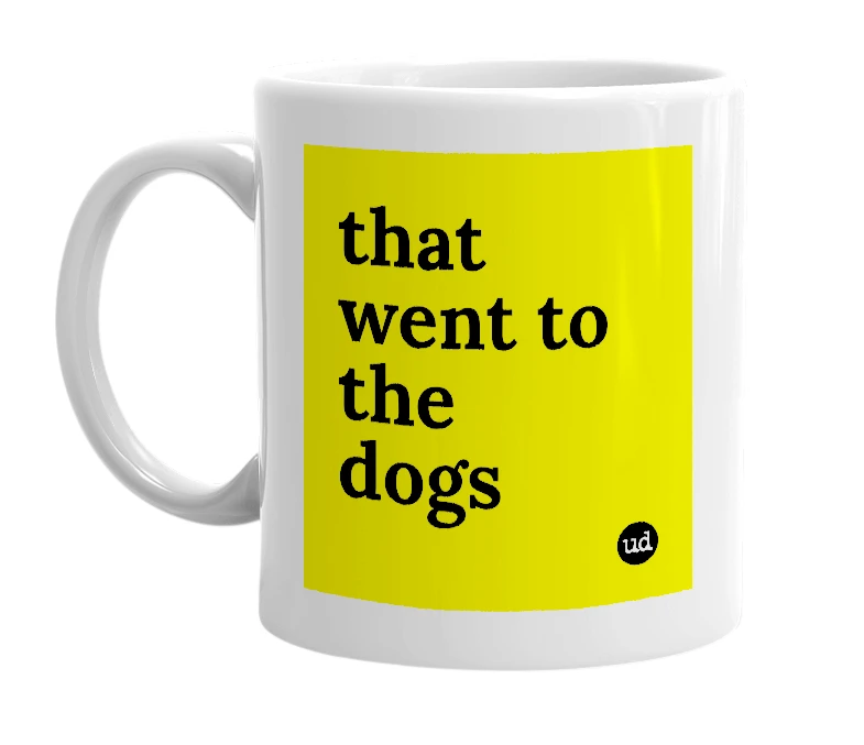 White mug with 'that went to the dogs' in bold black letters