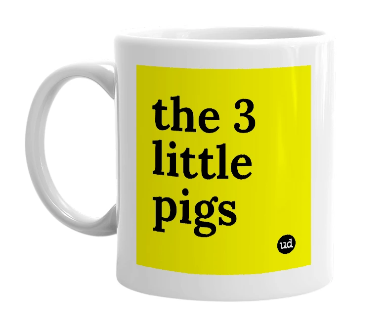White mug with 'the 3 little pigs' in bold black letters