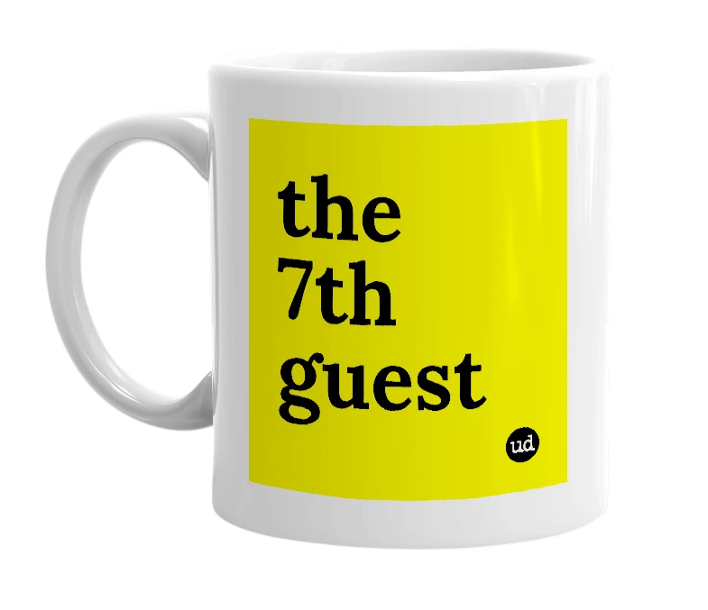 White mug with 'the 7th guest' in bold black letters