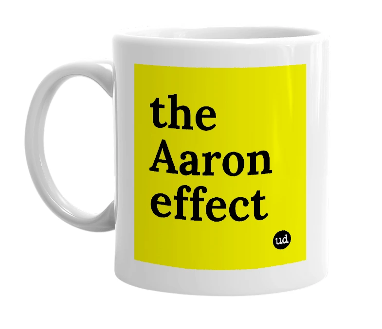 White mug with 'the Aaron effect' in bold black letters