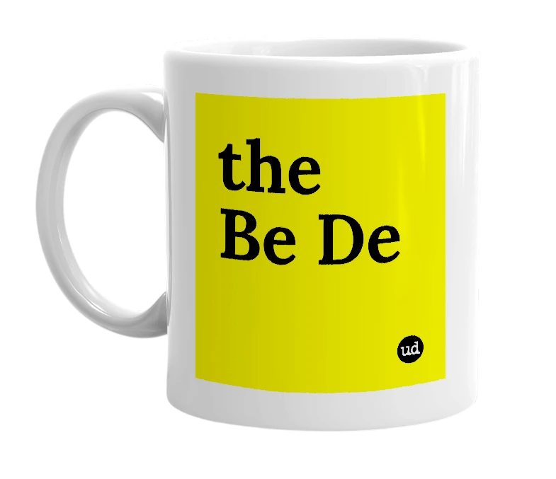 White mug with 'the Be De' in bold black letters