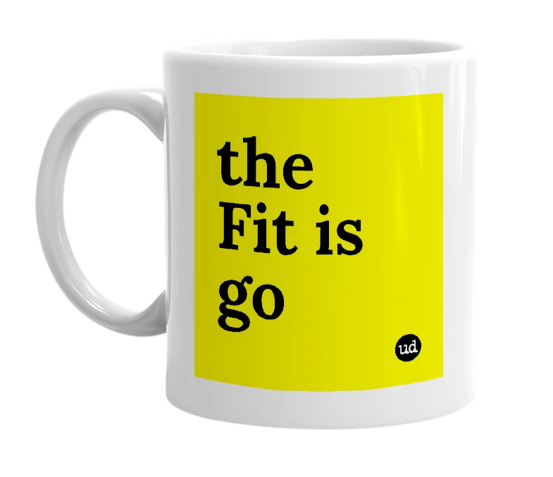 White mug with 'the Fit is go' in bold black letters