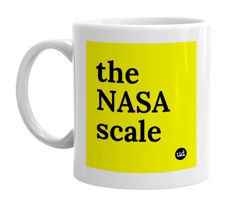 White mug with 'the NASA scale' in bold black letters