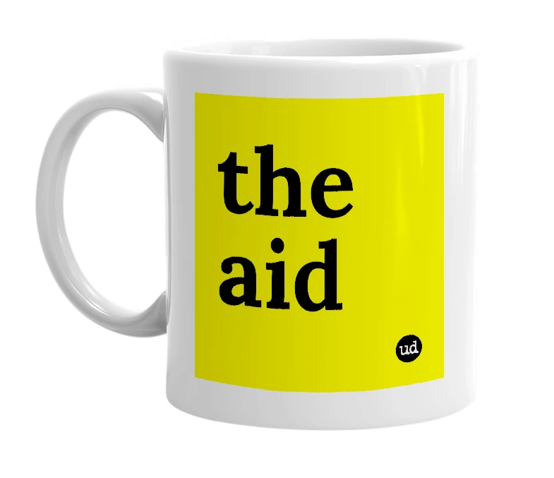 White mug with 'the aid' in bold black letters