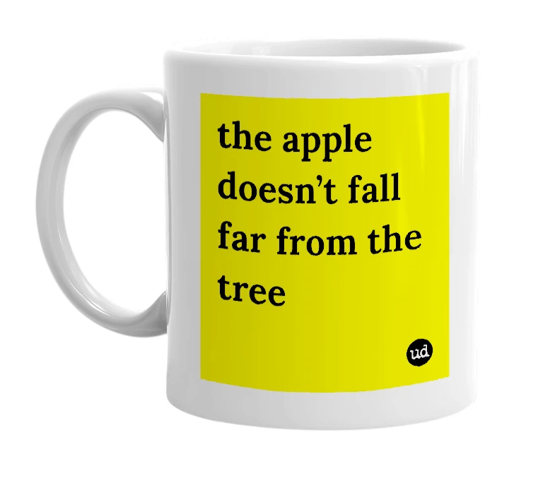 White mug with 'the apple doesn’t fall far from the tree' in bold black letters