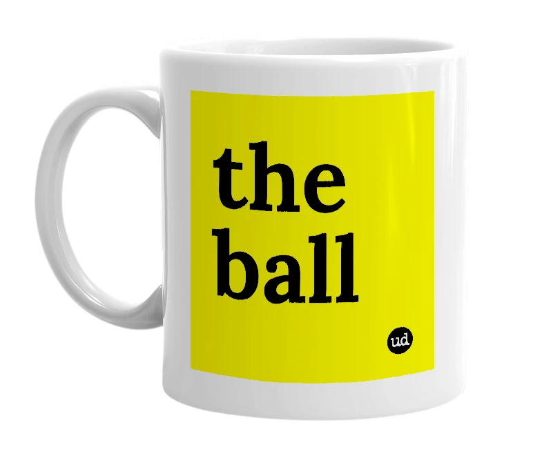 White mug with 'the ball' in bold black letters