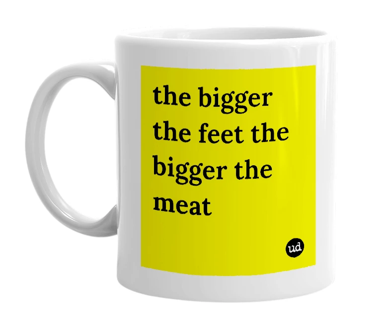 White mug with 'the bigger the feet the bigger the meat' in bold black letters