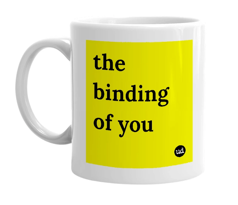 White mug with 'the binding of you' in bold black letters