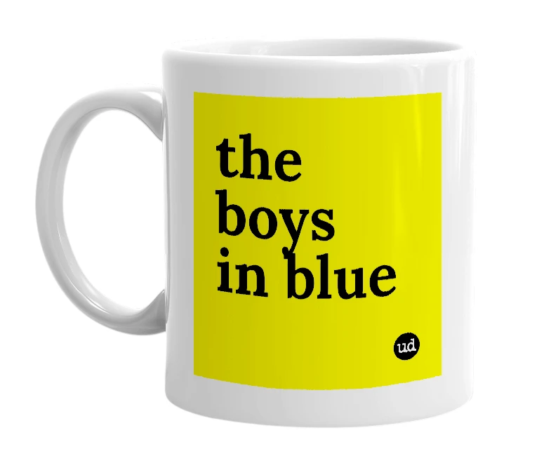 White mug with 'the boys in blue' in bold black letters