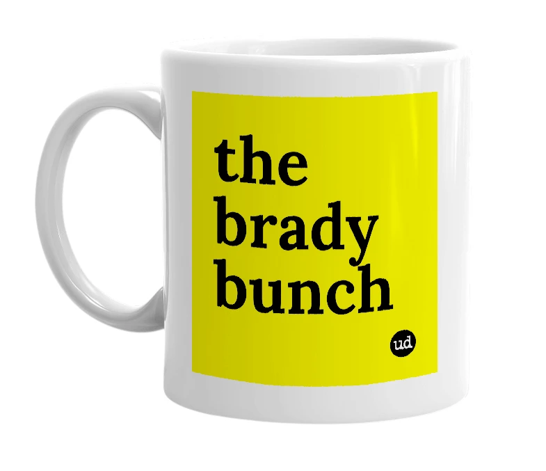 White mug with 'the brady bunch' in bold black letters