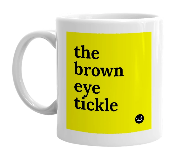 White mug with 'the brown eye tickle' in bold black letters