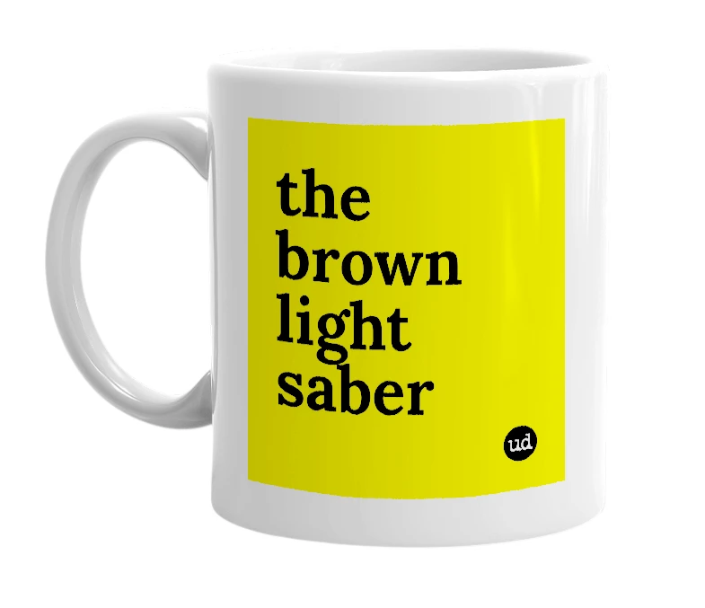 White mug with 'the brown light saber' in bold black letters