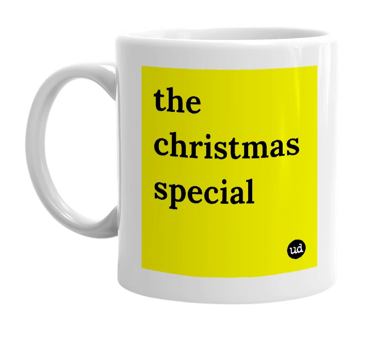 White mug with 'the christmas special' in bold black letters